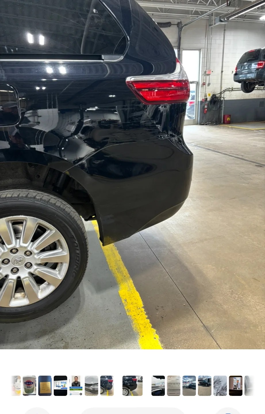 Black SUV bumper with mirror-like glossy finish after restoration