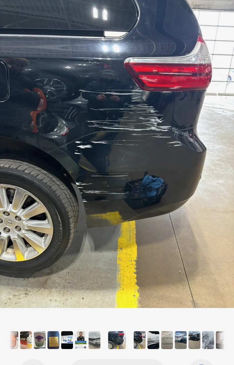 Black SUV bumper with visible imperfections before buffing